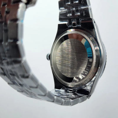 Rolex Stainless Steel Date Watch with Fluted Bezel & Black Stone-Set Face